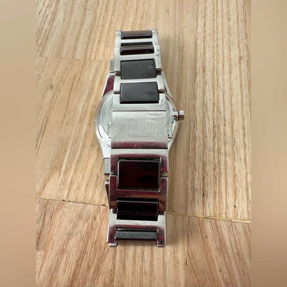 Bering ceramic ladies two tone gray and silver dress watch NEW BATTERY